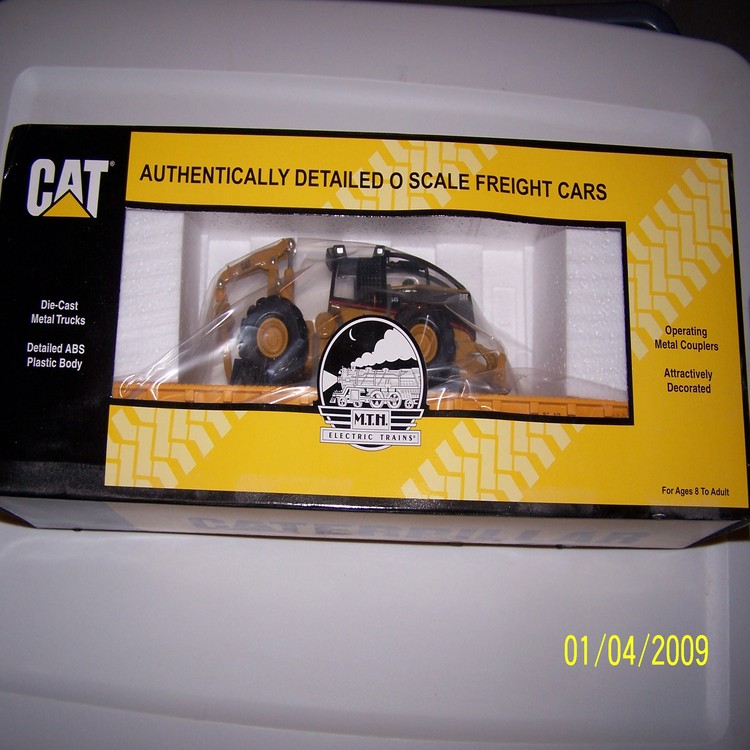MTH Caterpillar flatcar with skidder